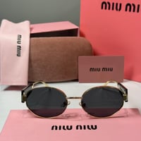 نظارة ميو ميو بعدسة دائرية باللون الذهبي والاسود