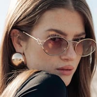 نظارة ميو ميو (Logo) باللون الذهبي وعدسة برتقالية