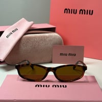 نظارة ميو ميو Line باللون التايقر وعدسة بني