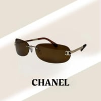 نظارة شانيل بدون إطار باللون الذهبي وعدسة بني