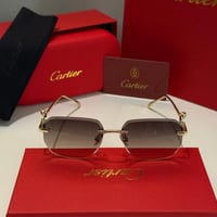 نظارة كارتير بدون أطار باللون الذهبي وشعار دائري