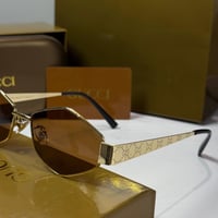 نظارة قوتشي باللون الذهبي وعدسة سداسية باللون البن...