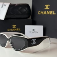 نظارة شانيل Cat eye باللون الابيض والاسود وعدسة سو...