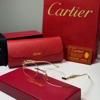 نظارة كارتير بدون إطار باللون الذهبي وعدسة شفافة