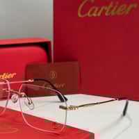 نظارة كارتير بدون إطار بذراع نحيل ذهبي وعدسة شفافة