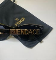 نظارة Fندي باللون الاسود وشعار بارز في الذراع