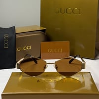 نظارة قوتشي باللون الذهبي وعدسة سداسية باللون البن...