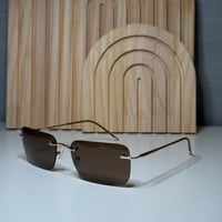 نظارة من AIRLITE بدون إطار باللون البني