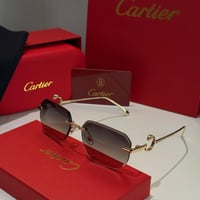 نظارة كارتير بدون أطار باللون الذهبي وشعار دائري