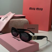 نظارة ميو ميو عدسة بيضاوية باللون الاسود