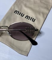 نظارة ميو mيو باللون الفضي