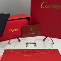 نظارة كارتير بدون إطار بذراع نحيل ذهبي وعدسة شفافة