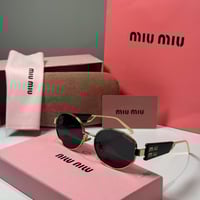 نظارة ميو ميو بعدسة دائرية باللون الذهبي والاسود