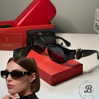 نظارة كارتير باللون الاسود وشعار الفهد الذهبي