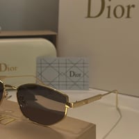 نظارة ديور بإطار معدني ذهبي وعدسة سوداء