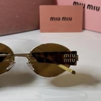 نظارة ميو ميو ذهبي وتايقر