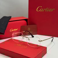 نظارة كارتير بدون إطار بذراع نحيل ذهبي وعدسة شفافة