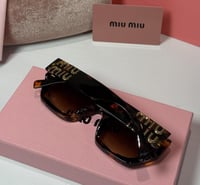 نظارة ميو ميو تايقر