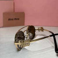 نظارة ميو ميو باللون الذهبي عدسة بني