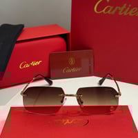 نظارة كارتير بدون إطار بذراع نحيل ذهبي وعدسة بنية