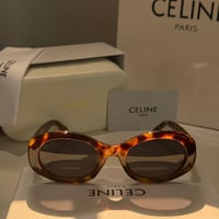 نظارة سيليN باللون التايقر بإطار بيضاوي