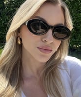 نظارة Sان لوران باللون الاسود بعدسة بيضاوية شعار ذ...