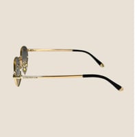 نظارة لويس فيتون بعدسة بيضاوية باللون الذهبي وعدسة...