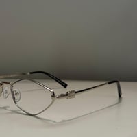 نظارة ميو ميو عدسة سداسية شفافة باللون الفضي