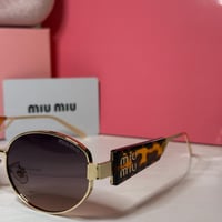 نظارة ميو ميو تايقر بعدسة بيضاوية باللون البني الم...