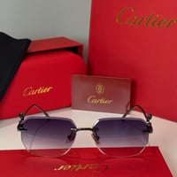 نظارة كارتير بدون أطار باللون الفضي وشعار دائري