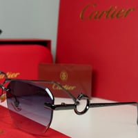 نظارة كارتير بدون أطار باللون الفضي وشعار دائري