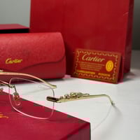 نظارة كارتير بدون إطار باللون الذهبي وعدسة شفافة