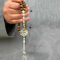 سبحة بالاسم عين النمر