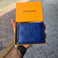 محافظ رجالية ماركات مميزة من ريفـان