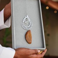 تعليقة سيارة قطرة مع كسرة العود