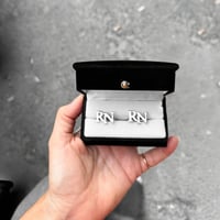 كبكات ثياب رجاليه بتصميم حرفين