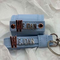 طقم سيارة مسكة دريكسون جلد مع مدالية مفاتيح بالاسم