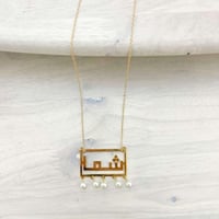 سلسال ناعم مع لؤلؤ مطلي بالذهب