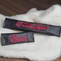 مسكة سكان سيارات مع مسكه حزام الامان