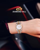 ساعة نسائية ماركة دايموندهيل فضي ذهبي مينا ابيض DH...