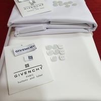 قماش جيفنشي صيفي كريمي ابيض أو ياباني نص واقف