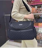 شنطة قوتشي للمواليد