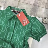 فستان كارولينا هريرا أخضر بحزام