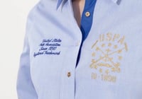 قميص بولو الأصلي مطرز