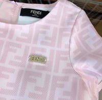 فستان فيندي مزين بالتل