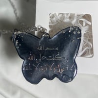 تعليقة سيارة شكل فراشه