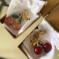 تشارمز وتعليقة كوتش ماستر مع العلبة