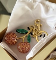 تشارمز وتعليقة كوتش ماستر مع العلبة