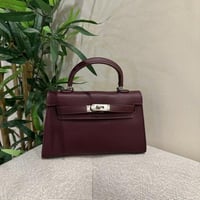 شنطة يد LIMITED EDITIONلون برغندي