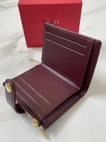 محفظة كارولينا هيريرا